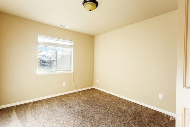 view of carpeted spare room