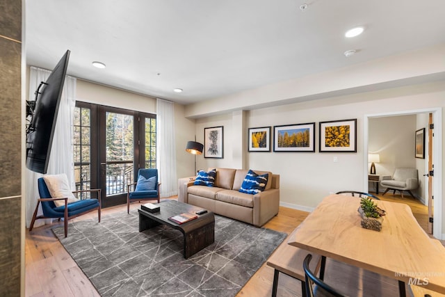 living room with dark hardwood / wood-style floors