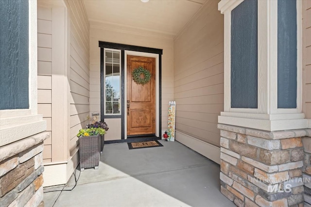 property entrance with a porch