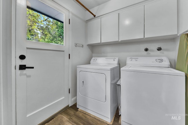 713 E Harcourt Rd, Boise, ID 83702 - laundry room with cabinet space, washing machine and dryer, and dark wood-style flooring