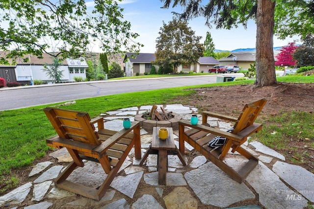 713 E Harcourt Rd, Boise, ID 83702 - view of patio / terrace with a residential view and a fire pit