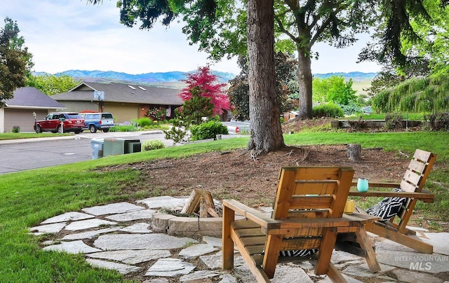 713 E Harcourt Rd, Boise, ID 83702 - view of green lawn featuring a mountain view
