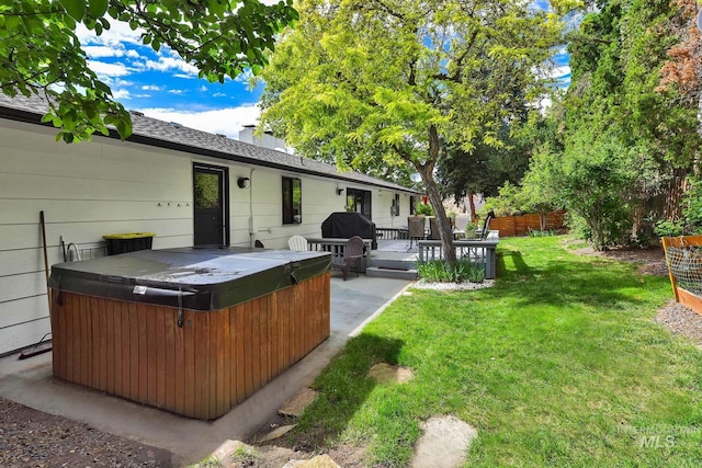 713 E Harcourt Rd, Boise, ID 83702 - view of yard featuring a hot tub and a wooden deck