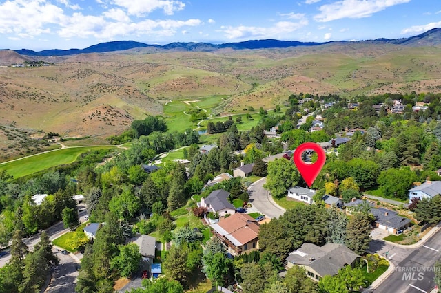 713 E Harcourt Rd, Boise, ID 83702 - aerial overview of property's location with a mountainous background and nearby suburban area