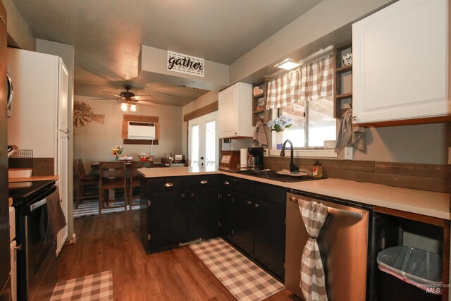 kitchen featuring ceiling fan, sink, stove, dishwasher, and white cabinetry