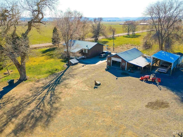 birds eye view of property featuring a rural view