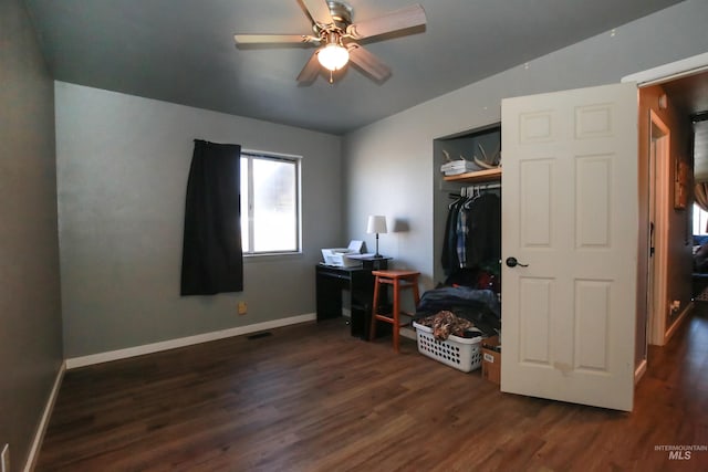 office with dark hardwood / wood-style floors and ceiling fan