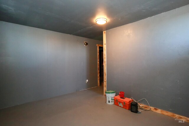 rec room featuring concrete flooring