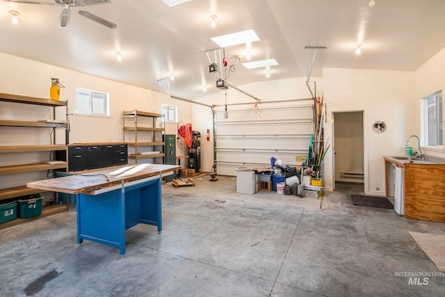 garage with a baseboard radiator and a sink