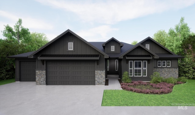 2109 N Peakhurt Ave, Kuna, ID 83634 - craftsman-style home featuring stone siding, board and batten siding, and an attached garage