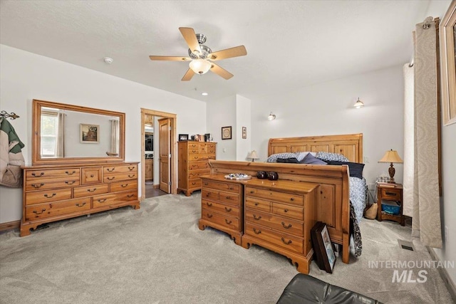 3415 Marble Front Rd, Caldwell, ID 83605 - bedroom featuring light carpet, a ceiling fan, and ensuite bath