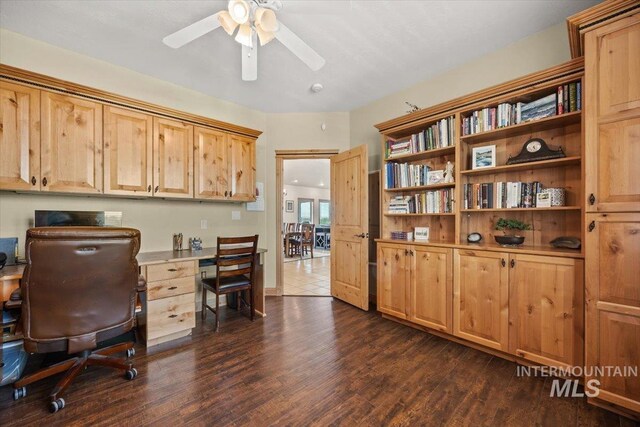 3415 Marble Front Rd, Caldwell, ID 83605 - home office featuring dark wood-style flooring and a ceiling fan