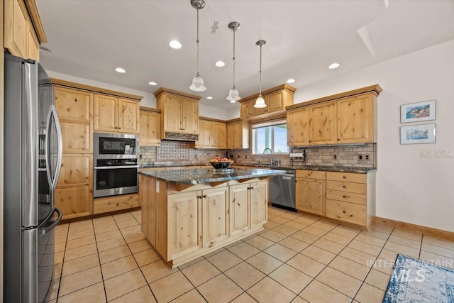 3415 Marble Front Rd, Caldwell, ID 83605 - kitchen with appliances with stainless steel finishes, a center island, tasteful backsplash, light tile patterned floors, and recessed lighting