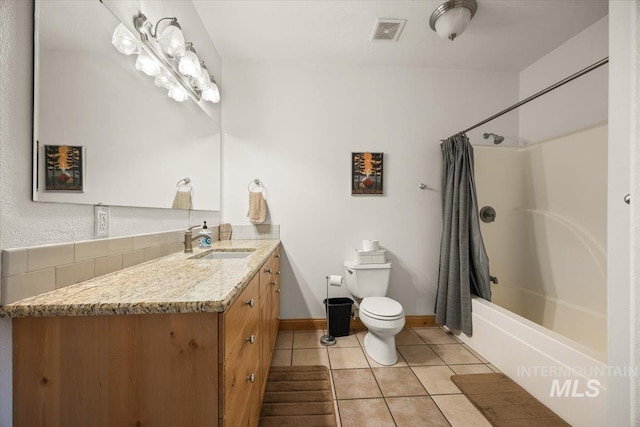 3415 Marble Front Rd, Caldwell, ID 83605 - bathroom featuring toilet, tile patterned flooring, shower / tub combo with curtain, vanity, and baseboards