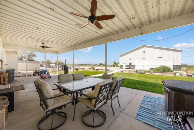 3415 Marble Front Rd, Caldwell, ID 83605 - view of patio / terrace featuring ceiling fan, outdoor dining space, and a sink