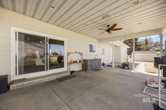 3415 Marble Front Rd, Caldwell, ID 83605 - view of patio / terrace featuring ceiling fan and fence