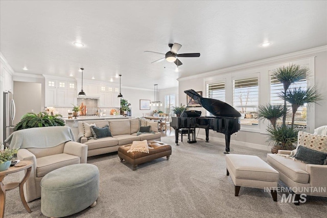 4071 S Twilight Rise Ave, Meridian, ID 83642 - living area with ceiling fan, crown molding, recessed lighting, and light carpet