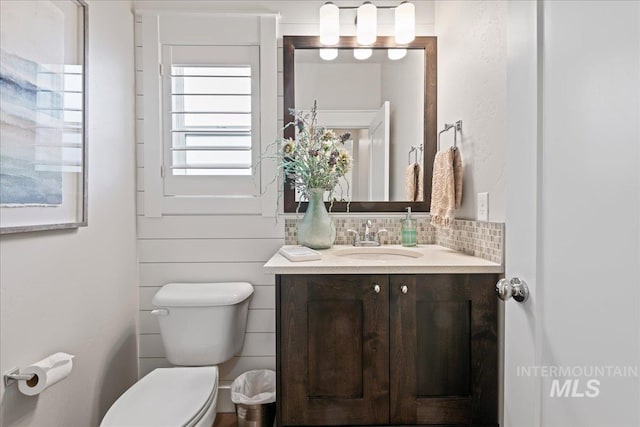 4071 S Twilight Rise Ave, Meridian, ID 83642 - half bathroom with vanity and tasteful backsplash