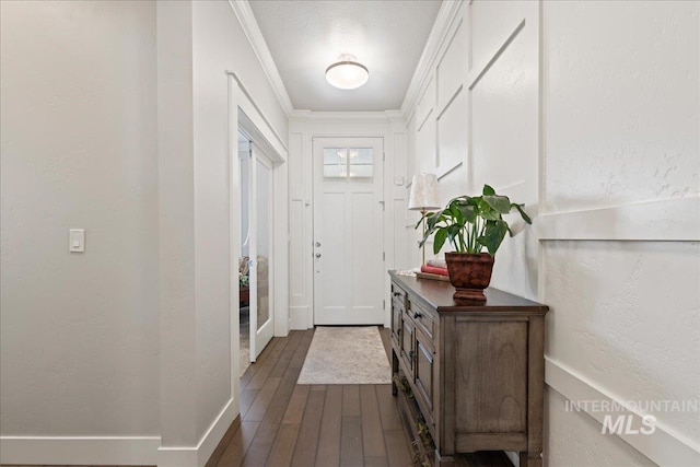4071 S Twilight Rise Ave, Meridian, ID 83642 - foyer entrance with dark wood-type flooring, crown molding, and a textured wall