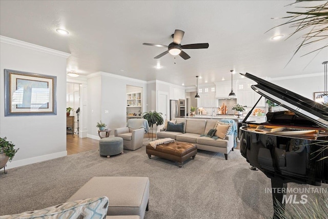 4071 S Twilight Rise Ave, Meridian, ID 83642 - carpeted living area featuring ceiling fan, ornamental molding, and recessed lighting