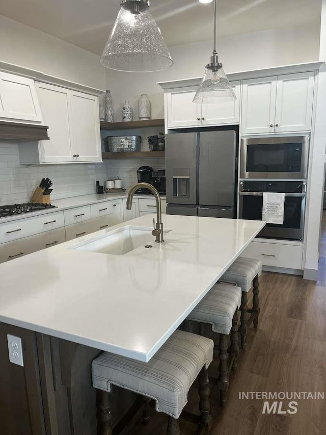 11703 W Amsonia, Star, ID 83669 - kitchen featuring stainless steel fridge, wall oven, a sink, gas stovetop, and open shelves