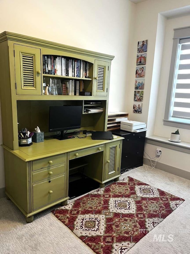 11703 W Amsonia, Star, ID 83669 - office area featuring light carpet and built in study area