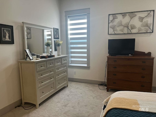 11703 W Amsonia, Star, ID 83669 - bedroom with multiple windows, light carpet, and baseboards
