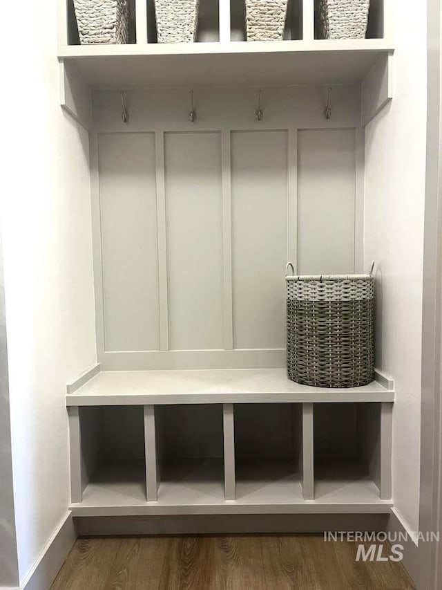 11703 W Amsonia, Star, ID 83669 - mudroom featuring baseboards and wood finished floors
