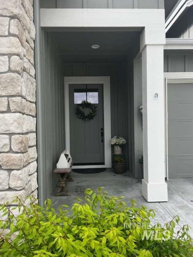 11703 W Amsonia, Star, ID 83669 - property entrance featuring stone siding