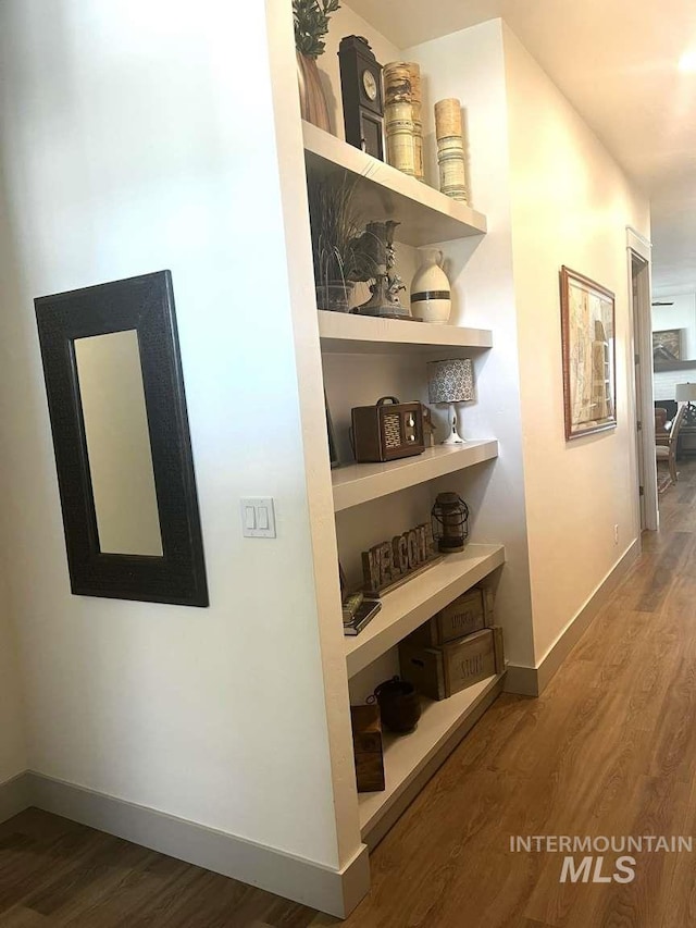 11703 W Amsonia, Star, ID 83669 - hallway featuring wood finished floors and baseboards