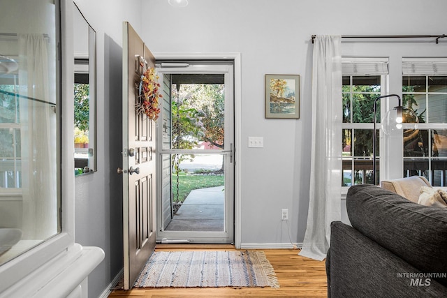 doorway featuring light hardwood / wood-style floors