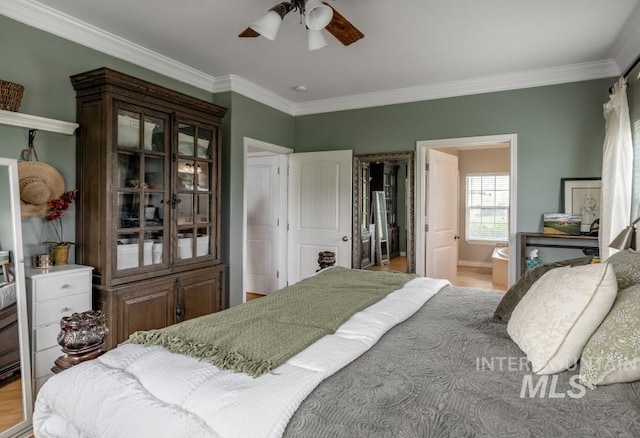 1027 Larkspur, Moscow, ID 83843 - bedroom with crown molding, ceiling fan, connected bathroom, and baseboards