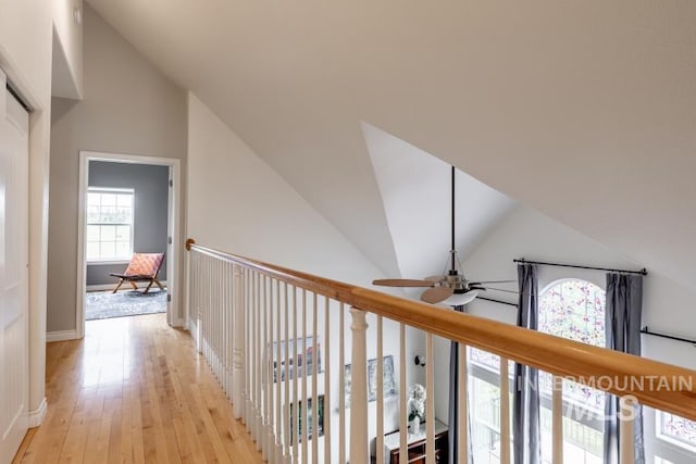 1027 Larkspur, Moscow, ID 83843 - corridor featuring lofted ceiling, light wood finished floors, and baseboards
