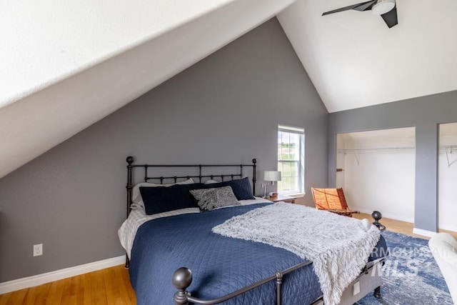 1027 Larkspur, Moscow, ID 83843 - bedroom featuring vaulted ceiling, wood finished floors, and baseboards