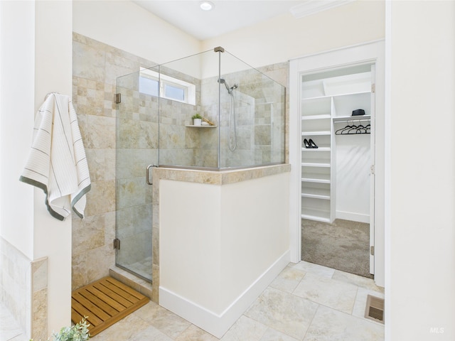 9389 W Wildbranch, Star, ID 83669 - bathroom featuring a spacious closet and a stall shower