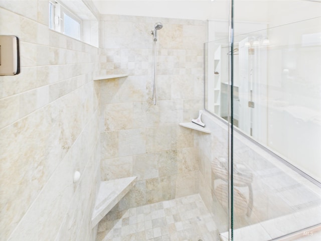 9389 W Wildbranch, Star, ID 83669 - bathroom featuring a tile shower