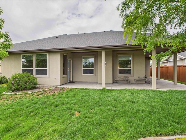9389 W Wildbranch, Star, ID 83669 - back of house featuring stucco siding, a patio area, and roof with shingles