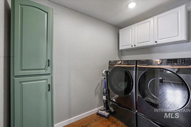 1011 Filer Ave W, Twin Falls, ID 83301 - washroom with cabinet space, dark wood-style floors, baseboards, washer and clothes dryer, and recessed lighting
