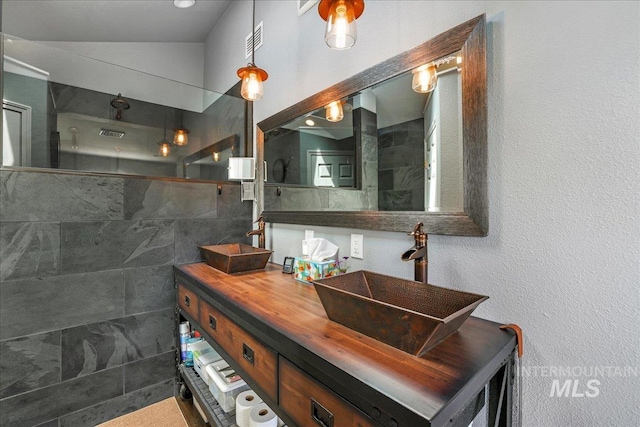 1011 Filer Ave W, Twin Falls, ID 83301 - full bathroom featuring double vanity and a walk in shower