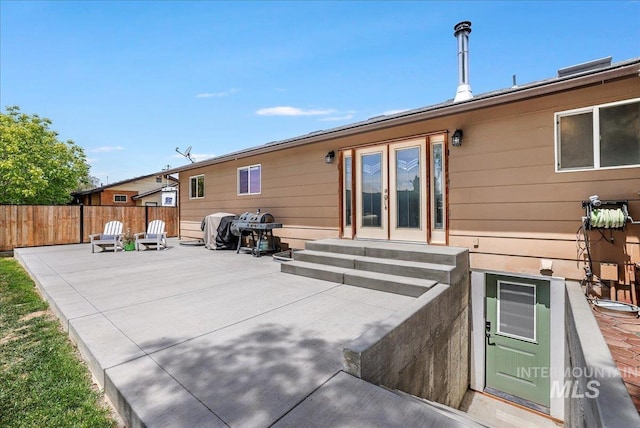 1011 Filer Ave W, Twin Falls, ID 83301 - rear view of house featuring entry steps and a patio area