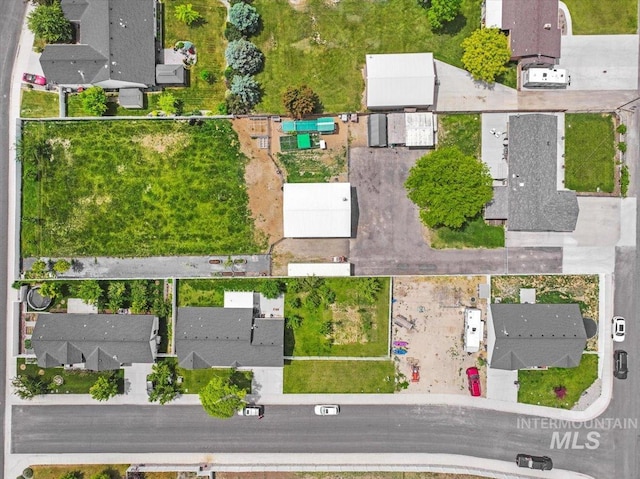 1011 Filer Ave W, Twin Falls, ID 83301 - aerial perspective of suburban area featuring property boundaries highlighted