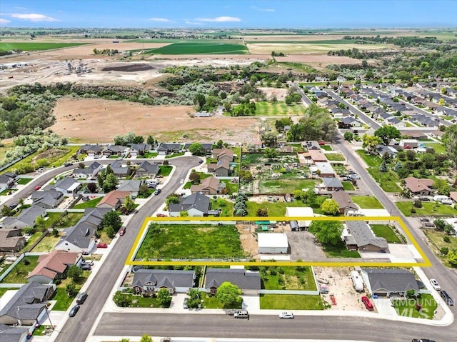1011 Filer Ave W, Twin Falls, ID 83301 - aerial overview of property's location featuring property boundaries highlighted and nearby suburban area