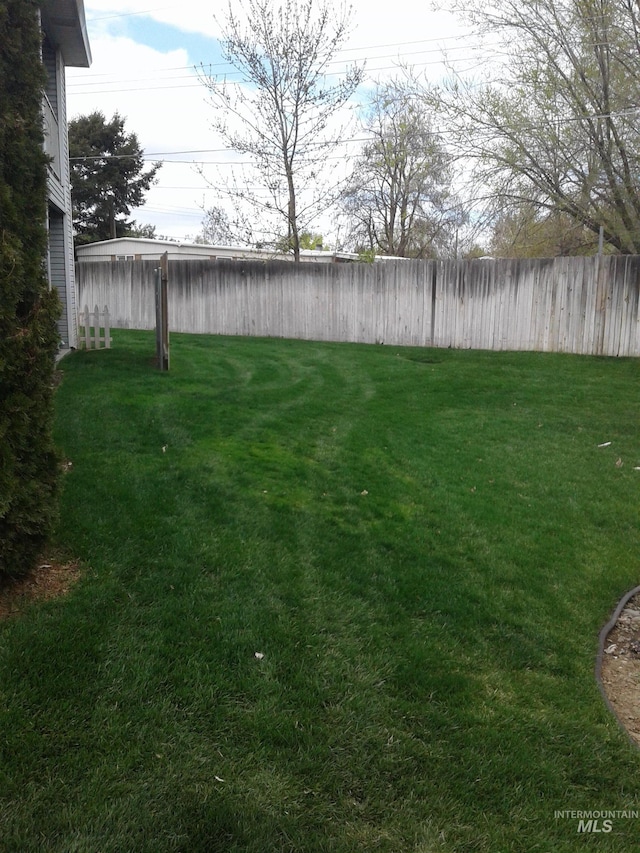 view of yard featuring fence