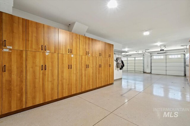 6964 N Moon Drummer Way, Meridian, ID 83646 - garage featuring a central vacuum unit