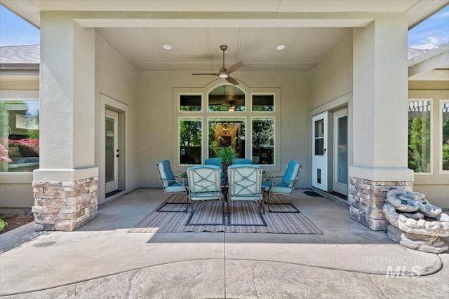 6964 N Moon Drummer Way, Meridian, ID 83646 - view of patio / terrace featuring ceiling fan and outdoor dining area