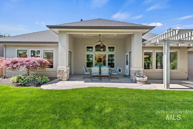 6964 N Moon Drummer Way, Meridian, ID 83646 - rear view of property with a pergola, a ceiling fan, a patio, a yard, and stucco siding
