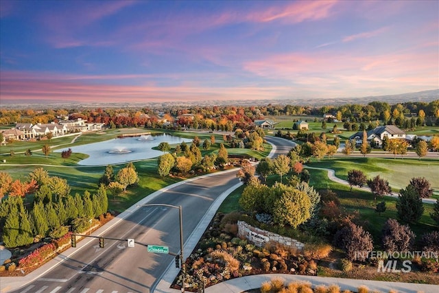 6964 N Moon Drummer Way, Meridian, ID 83646 - aerial perspective of suburban area with a golf club and a nearby body of water