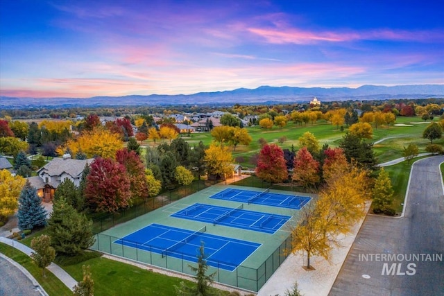 6964 N Moon Drummer Way, Meridian, ID 83646 - aerial view at dusk of a mountain view and golf course view