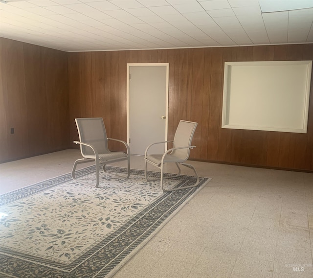 428 Orchard Dr, Gooding, ID 83330 - living area featuring tile patterned floors and wooden walls