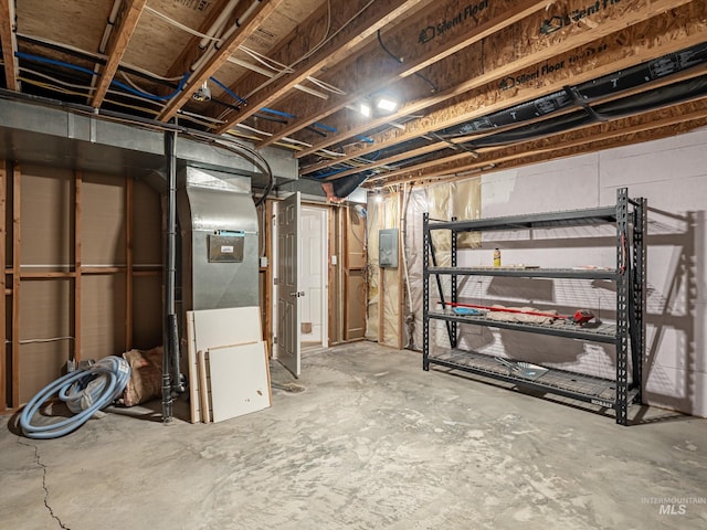 basement with electric panel